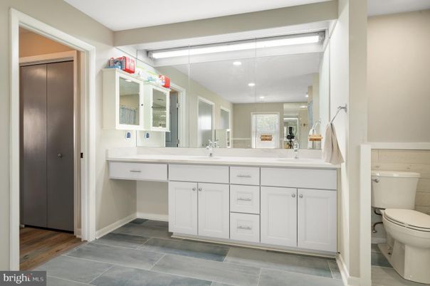 Bathroom, Dual Sink Vanities, Interior, Recessed Lighting, Wood Texture Flooring