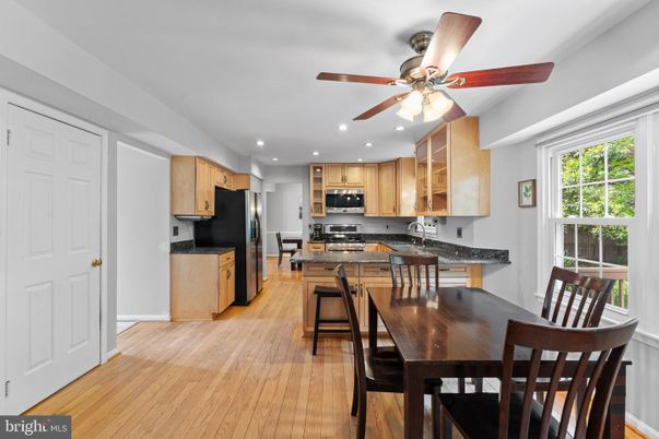 Dining room, Interior, Kitchen, Recessed Lighting, Stainless Steel Appliances, Wood Texture Flooring