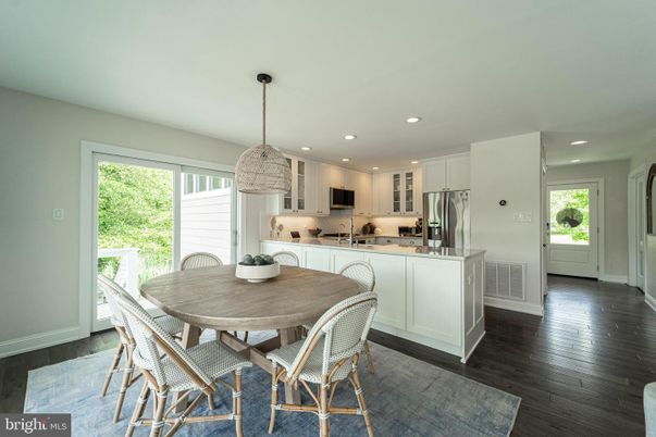 Dining room, Interior, Kitchen, Pendant Lights, Recessed Lighting, Stainless Steel Appliances, Wood Texture Flooring