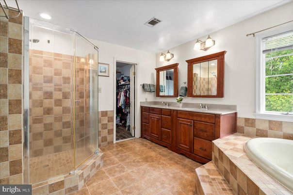 Bathroom, Dual Sink Vanities, Glass Shower, Interior, Recessed Lighting, Tile Countertops