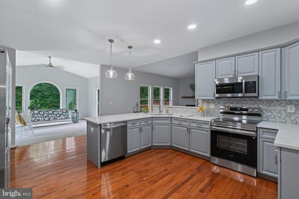 Interior, Kitchen, Pendant Lights, Recessed Lighting, Stainless Steel Appliances, Wood Texture Flooring