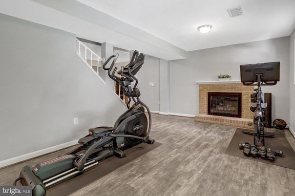 Fireplace, Fitness Equipment, Interior, Wood Texture Flooring