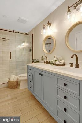 Bathroom, Dual Sink Vanities, Glass Shower, Interior, Wood Texture Flooring