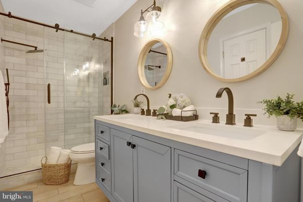 Bathroom, Dual Sink Vanities, Glass Shower, Interior, Wood Texture Flooring