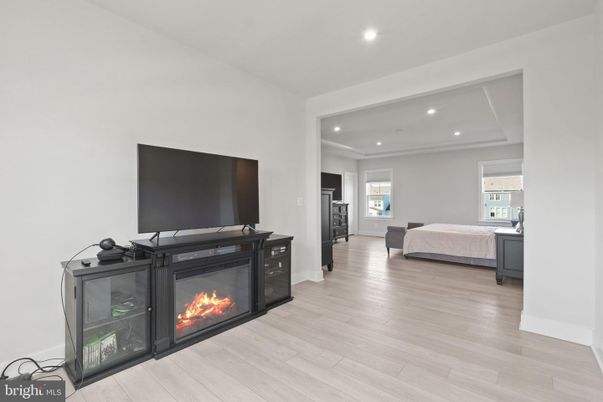 Bedroom, Fireplace, Interior, Recessed Lighting, Wood Texture Flooring