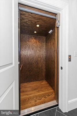 Elevator, Interior, Recessed Lighting, Wooden Ceilings, Wooden Walls