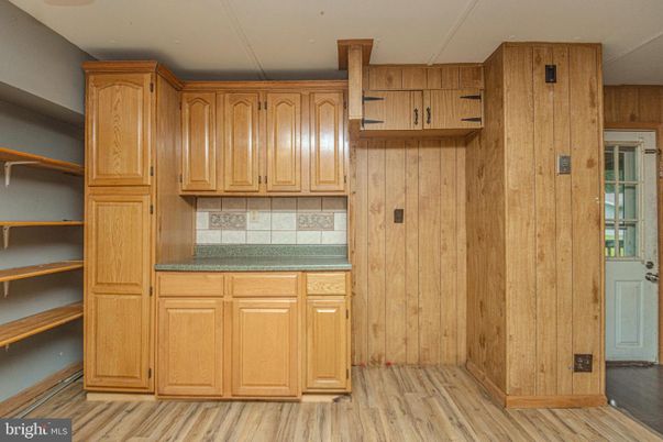 Interior, Kitchen, Tile Countertops, Wood Texture Flooring