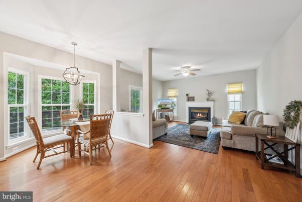 Chandelier, Dining room, Fireplace, Interior, Living room, Pendant Lights, Wood Texture Flooring