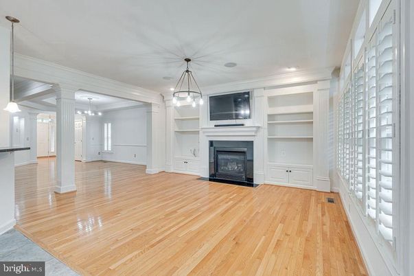 Empty room, Fireplace, Interior, Pendant Lights, Recessed Lighting, Wood Texture Flooring