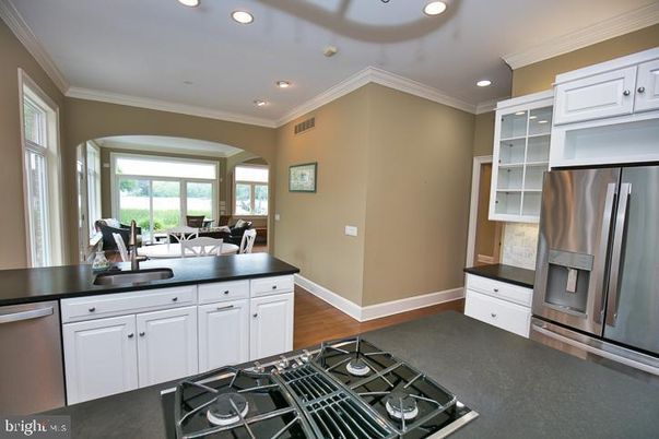 Dining room, Interior, Kitchen, Recessed Lighting, Stainless Steel Appliances, Wood Texture Flooring