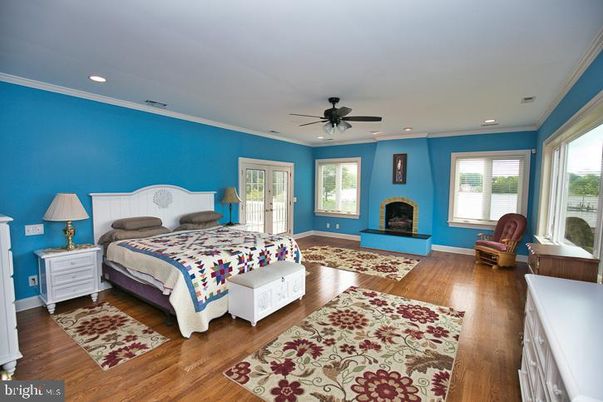 Bedroom, Fireplace, Interior, Recessed Lighting, Wood Texture Flooring