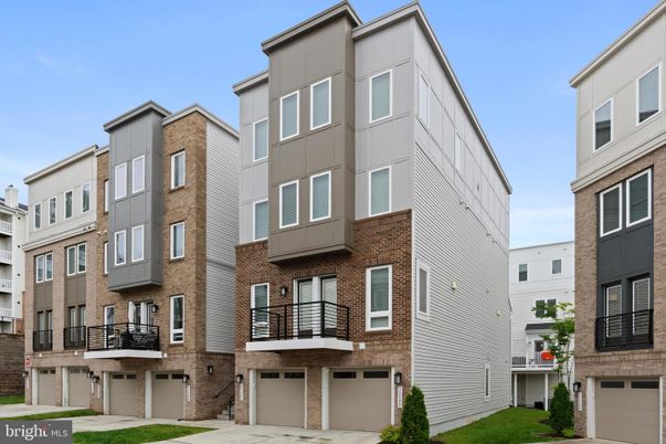 Attached, Exterior, Facade, Brick Facade, Rowhouse