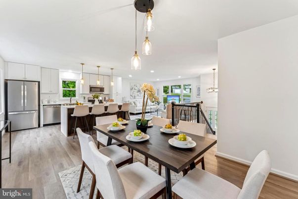 Dining room, Interior, Kitchen, Pendant Lights, Recessed Lighting, Stainless Steel Appliances, Wood Texture Flooring