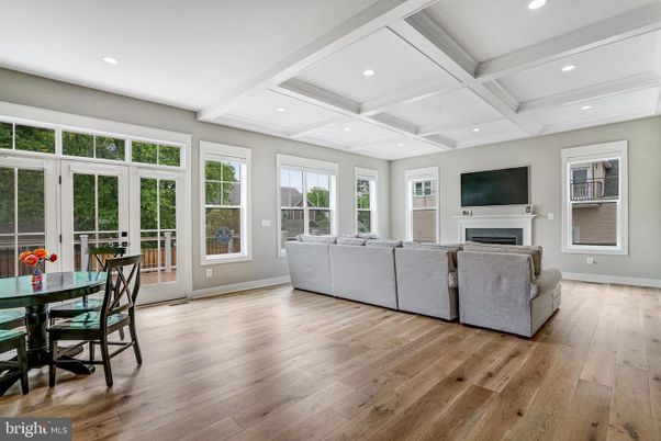 Dining room, Fireplace, Interior, Living room, Recessed Lighting, Wood Texture Flooring
