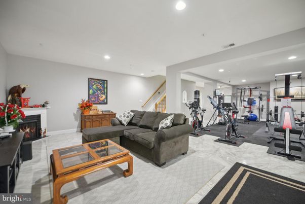Fireplace, Fitness Equipment, Interior, Living room, Recessed Lighting