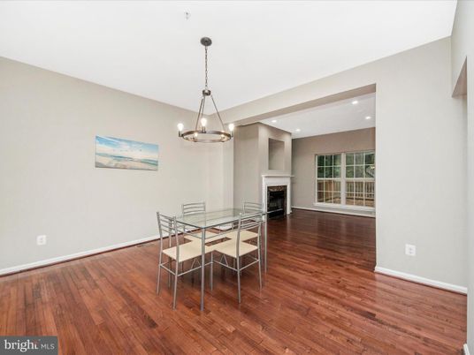 Chandelier, Dining room, Fireplace, Interior, Pendant Lights, Recessed Lighting, Wood Texture Flooring