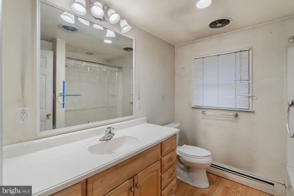 Bathroom, Glass Shower, Interior, Recessed Lighting, Wood Texture Flooring