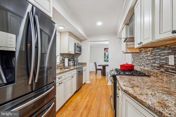 Dining room, Interior, Kitchen, Recessed Lighting, Stainless Steel Appliances, Wood Texture Flooring