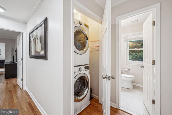Bathroom, Interior, Utility Closets, Washer, Wood Texture Flooring