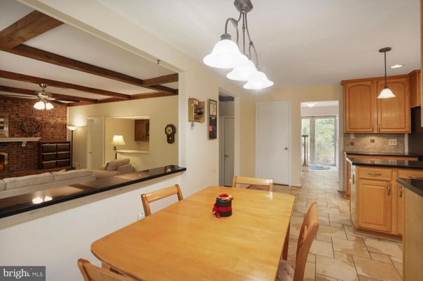 Dining room, Fireplace, Interior, Kitchen, Living room, Pendant Lights, Recessed Lighting, Stone Walls, Wooden Beams
