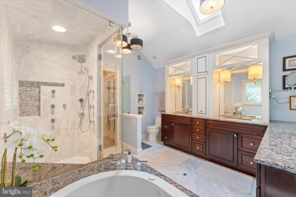 Bathroom, Dual Sink Vanities, Glass Shower, Interior, Marble Walls, Recessed Lighting