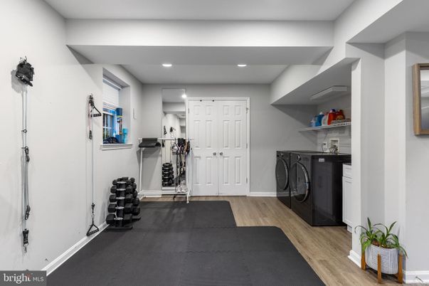 Fitness Equipment, Interior, Recessed Lighting, Washer, Wood Texture Flooring