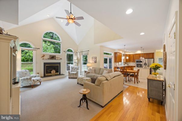 Dining room, Fireplace, Interior, Kitchen, Living room, Pendant Lights, Recessed Lighting, Stainless Steel Appliances, Wood Texture Flooring
