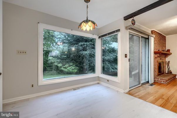 Empty room, Fireplace, Interior, Pendant Lights, Stone Walls, Wood Texture Flooring
