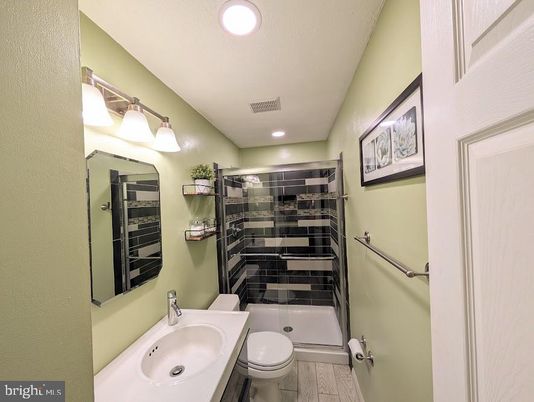 Bathroom, Glass Shower, Interior, Recessed Lighting, Walk-in Closets, Wood Texture Flooring