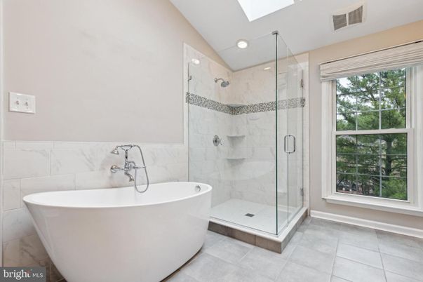 Bathroom, Free Standing Baths, Glass Shower, Interior, Marble Walls, Recessed Lighting