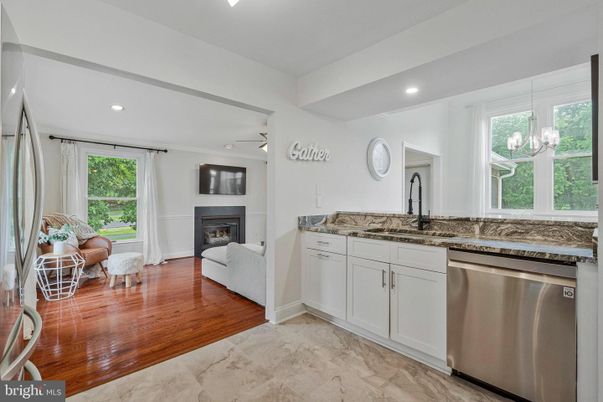 Fireplace, Interior, Kitchen, Living room, Recessed Lighting, Stainless Steel Appliances, Wood Texture Flooring