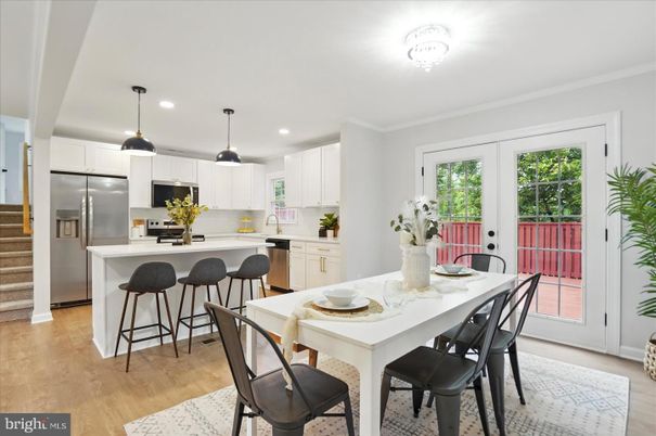 Dining room, Interior, Kitchen, Pendant Lights, Recessed Lighting, Stainless Steel Appliances, Wood Texture Flooring