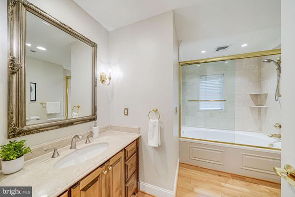 Bathroom, Glass Shower, Interior, Recessed Lighting, Wood Texture Flooring