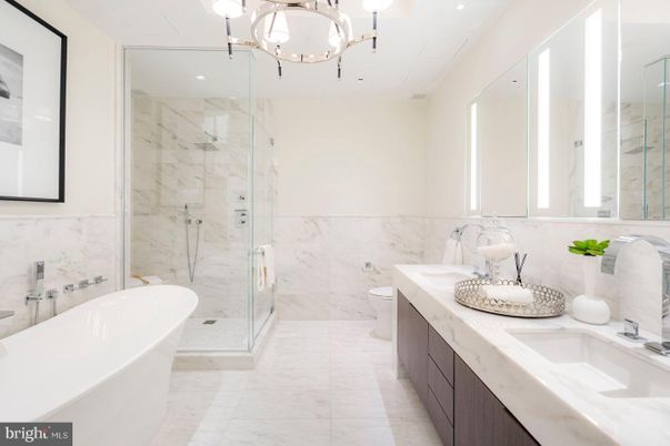 Bathroom, Dual Sink Vanities, Free Standing Baths, Glass Shower, Interior, Marble, Marble Walls, Recessed Lighting