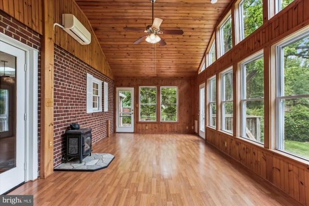 Empty room, Fireplace, Interior, Stone Walls, Sun Room, Wooden Ceilings, Wood Texture Flooring, Wooden Walls