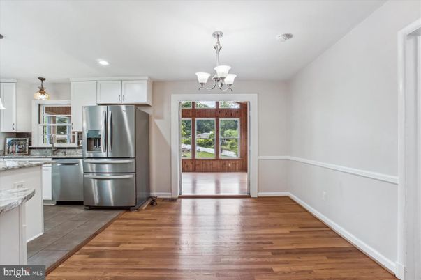 Chandelier, Interior, Kitchen, Recessed Lighting, Stainless Steel Appliances, Wood Texture Flooring
