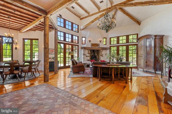 Chandelier, Dining room, Fireplace, Interior, Living room, Pendant Lights, Wooden Beams, Wood Texture Flooring