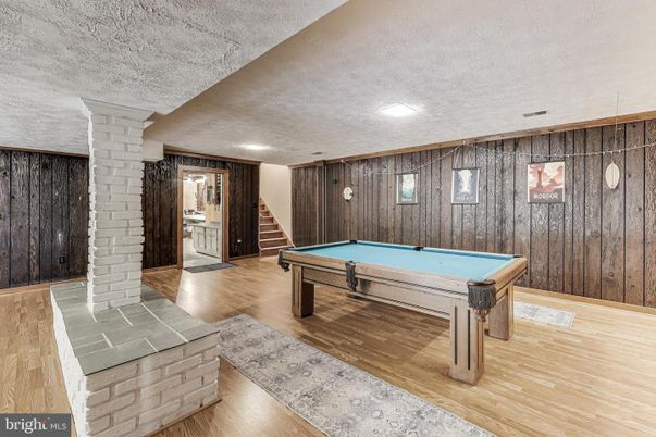 Billiard Table, Game Room, Interior, Recessed Lighting, Stone Walls, Wood Texture Flooring, Wooden Walls