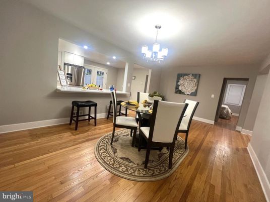 Chandelier, Dining room, Interior, Kitchen, Recessed Lighting, Stainless Steel Appliances, Wood Texture Flooring