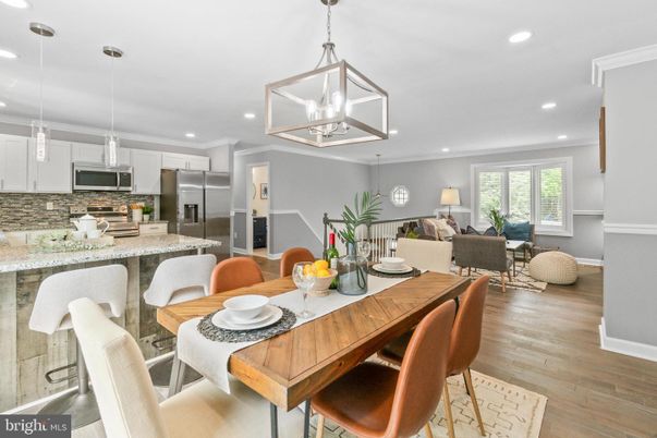 Dining room, Interior, Kitchen, Living room, Pendant Lights, Recessed Lighting, Stainless Steel Appliances, Wood Texture Flooring