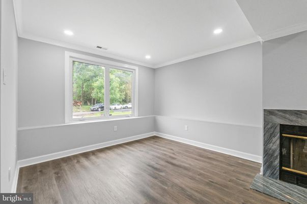 Empty room, Fireplace, Interior, Recessed Lighting, Wood Texture Flooring