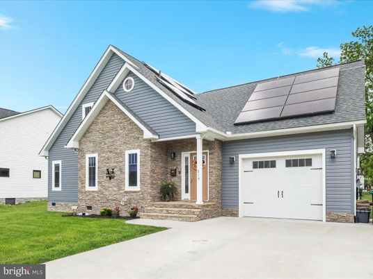 Attached, Exterior, Facade, Solar Panels, Brick Traditional