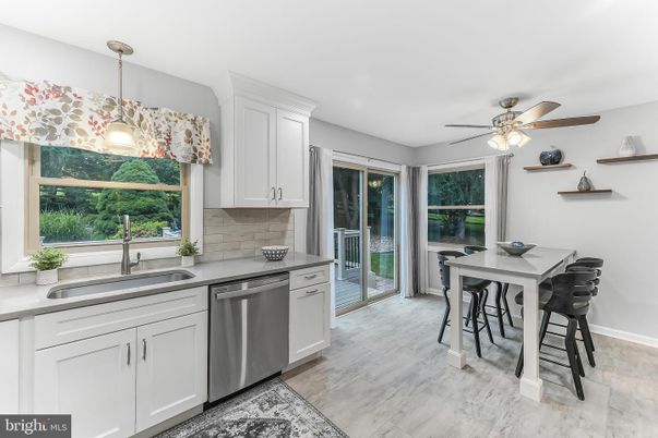 Dining room, Interior, Kitchen, Pendant Lights, Stainless Steel Appliances, Wood Texture Flooring