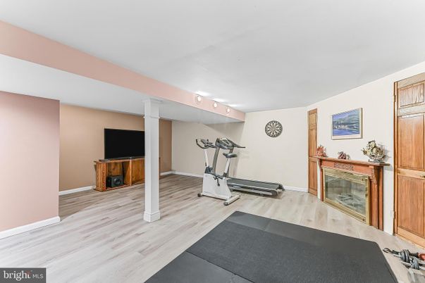 Fireplace, Fitness Equipment, Interior, Wood Texture Flooring