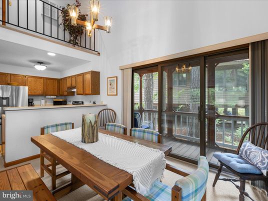 Chandelier, Dining room, Interior, Kitchen, Stainless Steel Appliances, Wood Texture Flooring