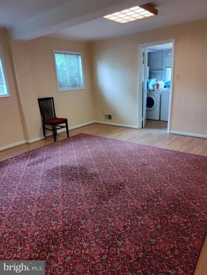 Empty room, Interior, Utility Closets, Washer, Wood Texture Flooring