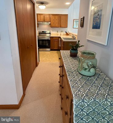 Interior, Kitchen, Recessed Lighting, Stainless Steel Appliances, Tile Countertops