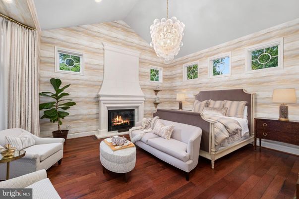 Bedroom, Chandelier, Fireplace, Interior, Recessed Lighting, Wood Texture Flooring