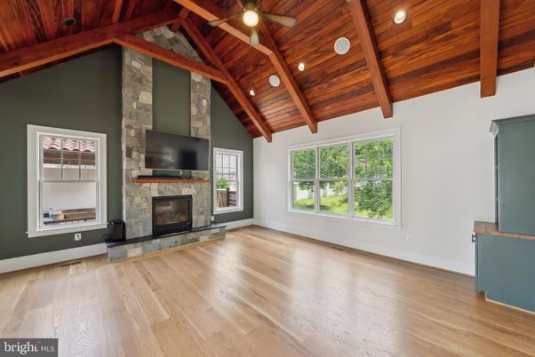 Empty room, Fireplace, Interior, Recessed Lighting, Wooden Beams, Wooden Ceilings, Wood Texture Flooring