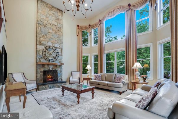 Chandelier, Fireplace, Interior, Living room, Stone Walls